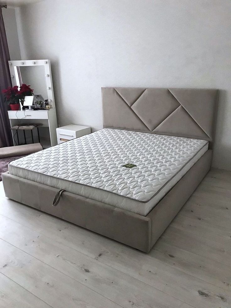 Sim with dressing mirror and a bedside table