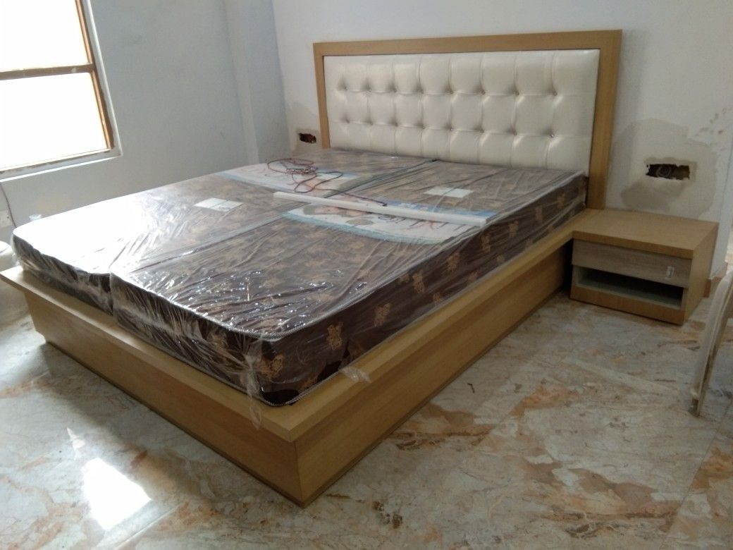 6 by 6 Puff Post bed with bedside cabinet